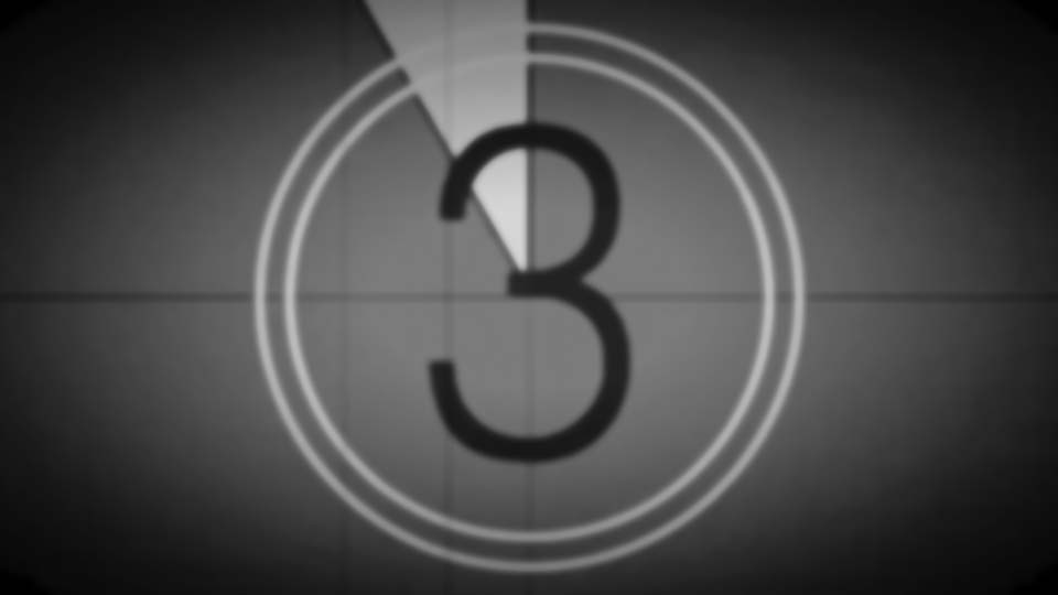 A series of video clips from CART HORSE's porfolio: a close-up of a hand working a video camera, a close-up of someone's hand playing an electric guitar on stage, a landscape shot of ocean waves crashing into a scenic beach